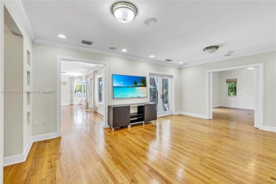 Set on a quiet, tree-lined street, this beautifully updated on Granada Golf Club in Florida - for sale on GolfHomes.com, golf home, golf lot