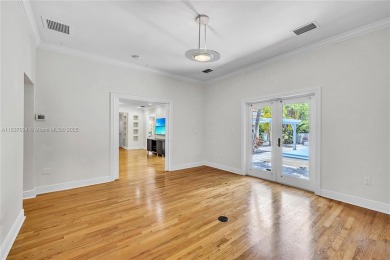 Set on a quiet, tree-lined street, this beautifully updated on Granada Golf Club in Florida - for sale on GolfHomes.com, golf home, golf lot