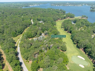 Views along the tranquil 12th green of the prestigious Jack on Great Waters Course At Reynolds Plantation in Georgia - for sale on GolfHomes.com, golf home, golf lot
