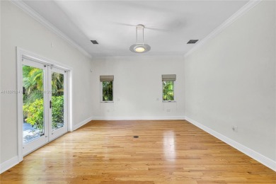 Set on a quiet, tree-lined street, this beautifully updated on Granada Golf Club in Florida - for sale on GolfHomes.com, golf home, golf lot