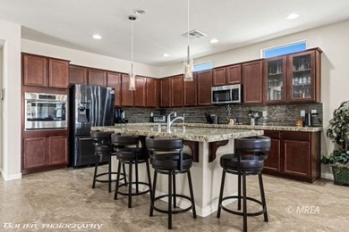 Discover this beautiful, gently lived-in home in Desert Ridge! on The Oasis Golf Club in Nevada - for sale on GolfHomes.com, golf home, golf lot