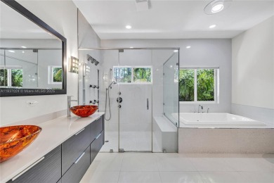 Set on a quiet, tree-lined street, this beautifully updated on Granada Golf Club in Florida - for sale on GolfHomes.com, golf home, golf lot