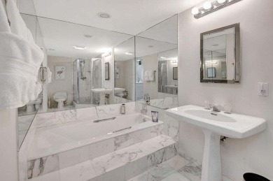 Enjoy the Florida lifestyle in this gorgeous 3rd-floor condo in on Boca Grove Golf and Tennis in Florida - for sale on GolfHomes.com, golf home, golf lot