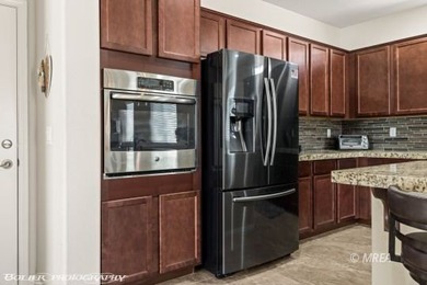 Discover this beautiful, gently lived-in home in Desert Ridge! on The Oasis Golf Club in Nevada - for sale on GolfHomes.com, golf home, golf lot