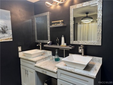 Welcome to this beautiful 3-bedroom, 2-bath pool home nestled in on Pine Ridge Community Golf and Country Club in Florida - for sale on GolfHomes.com, golf home, golf lot