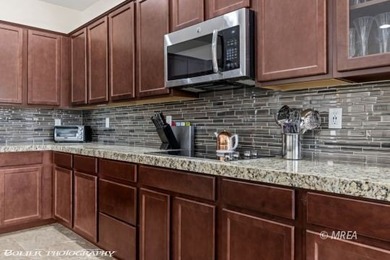 Discover this beautiful, gently lived-in home in Desert Ridge! on The Oasis Golf Club in Nevada - for sale on GolfHomes.com, golf home, golf lot