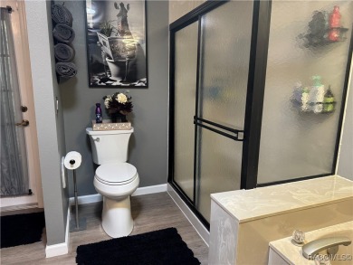 Welcome to this beautiful 3-bedroom, 2-bath pool home nestled in on Pine Ridge Community Golf and Country Club in Florida - for sale on GolfHomes.com, golf home, golf lot