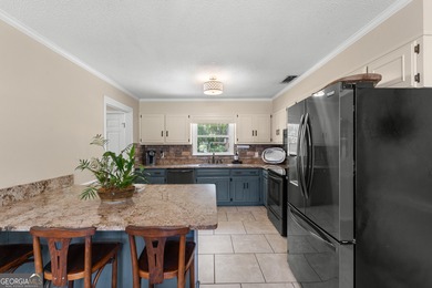 Welcome to your dream home in one of Statesboro's most on Forest Heights Country Club in Georgia - for sale on GolfHomes.com, golf home, golf lot