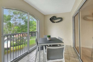 Enjoy the Florida lifestyle in this gorgeous 3rd-floor condo in on Boca Grove Golf and Tennis in Florida - for sale on GolfHomes.com, golf home, golf lot