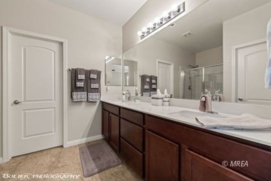 Discover this beautiful, gently lived-in home in Desert Ridge! on The Oasis Golf Club in Nevada - for sale on GolfHomes.com, golf home, golf lot