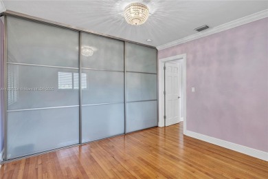 Set on a quiet, tree-lined street, this beautifully updated on Granada Golf Club in Florida - for sale on GolfHomes.com, golf home, golf lot