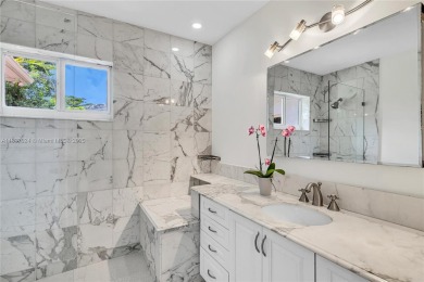 Set on a quiet, tree-lined street, this beautifully updated on Granada Golf Club in Florida - for sale on GolfHomes.com, golf home, golf lot