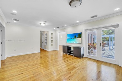 Set on a quiet, tree-lined street, this beautifully updated on Granada Golf Club in Florida - for sale on GolfHomes.com, golf home, golf lot