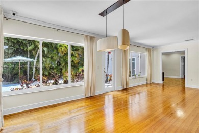 Set on a quiet, tree-lined street, this beautifully updated on Granada Golf Club in Florida - for sale on GolfHomes.com, golf home, golf lot
