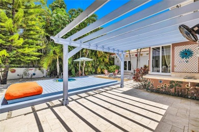 Set on a quiet, tree-lined street, this beautifully updated on Granada Golf Club in Florida - for sale on GolfHomes.com, golf home, golf lot