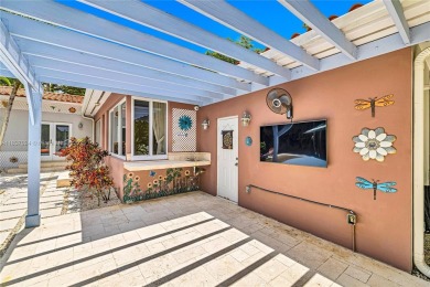 Set on a quiet, tree-lined street, this beautifully updated on Granada Golf Club in Florida - for sale on GolfHomes.com, golf home, golf lot