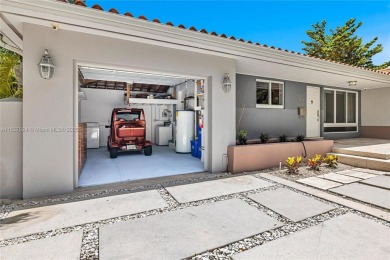 Set on a quiet, tree-lined street, this beautifully updated on Granada Golf Club in Florida - for sale on GolfHomes.com, golf home, golf lot