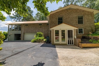 A Delightful Lake House with lots of extras!  A beautiful on Tanglewood Shores Golf and Country Club in Virginia - for sale on GolfHomes.com, golf home, golf lot