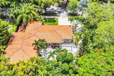 Set on a quiet, tree-lined street, this beautifully updated on Granada Golf Club in Florida - for sale on GolfHomes.com, golf home, golf lot