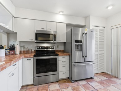 Furnished and priced to sell! Easy living in this spotless on The Meadows Golf and Country Club in Florida - for sale on GolfHomes.com, golf home, golf lot