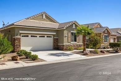 Discover this beautiful, gently lived-in home in Desert Ridge! on The Oasis Golf Club in Nevada - for sale on GolfHomes.com, golf home, golf lot