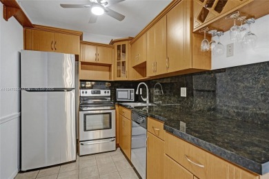 YOU'LL LOVE THIS MOVE-IN READY 2 BEDROOM, 2 BATH CONDO LOCATED on Pembroke Lakes Golf Club in Florida - for sale on GolfHomes.com, golf home, golf lot