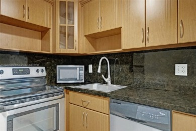 YOU'LL LOVE THIS MOVE-IN READY 2 BEDROOM, 2 BATH CONDO LOCATED on Pembroke Lakes Golf Club in Florida - for sale on GolfHomes.com, golf home, golf lot