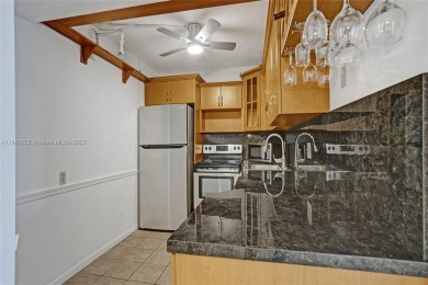 YOU'LL LOVE THIS MOVE-IN READY 2 BEDROOM, 2 BATH CONDO LOCATED on Pembroke Lakes Golf Club in Florida - for sale on GolfHomes.com, golf home, golf lot