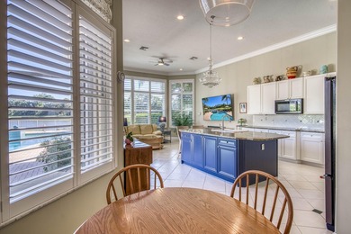 Expansive southern lake and golf views highlight this on Ironhorse Country Club in Florida - for sale on GolfHomes.com, golf home, golf lot