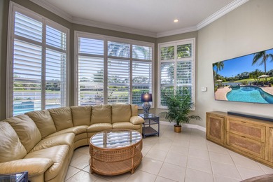 Expansive southern lake and golf views highlight this on Ironhorse Country Club in Florida - for sale on GolfHomes.com, golf home, golf lot