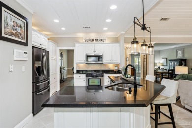 Beautifully updated and meticulously maintained lake front home on Tiger Point Golf and Country Club in Florida - for sale on GolfHomes.com, golf home, golf lot