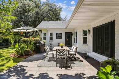 Beautifully updated and meticulously maintained lake front home on Tiger Point Golf and Country Club in Florida - for sale on GolfHomes.com, golf home, golf lot
