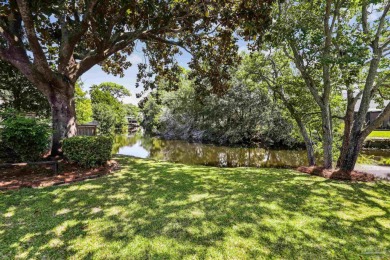 Beautifully updated and meticulously maintained lake front home on Tiger Point Golf and Country Club in Florida - for sale on GolfHomes.com, golf home, golf lot