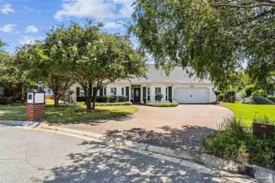 Beautifully updated and meticulously maintained lake front home on Tiger Point Golf and Country Club in Florida - for sale on GolfHomes.com, golf home, golf lot