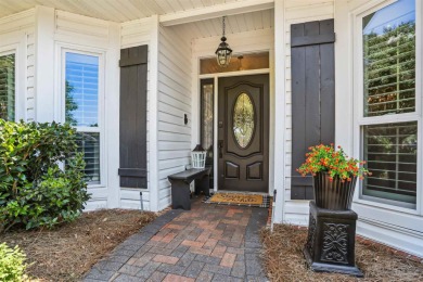 Beautifully updated and meticulously maintained lake front home on Tiger Point Golf and Country Club in Florida - for sale on GolfHomes.com, golf home, golf lot