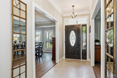 Beautifully updated and meticulously maintained lake front home on Tiger Point Golf and Country Club in Florida - for sale on GolfHomes.com, golf home, golf lot