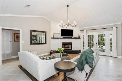 Beautifully updated and meticulously maintained lake front home on Tiger Point Golf and Country Club in Florida - for sale on GolfHomes.com, golf home, golf lot