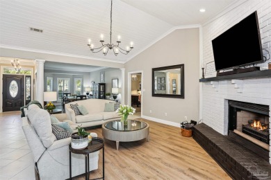 Beautifully updated and meticulously maintained lake front home on Tiger Point Golf and Country Club in Florida - for sale on GolfHomes.com, golf home, golf lot