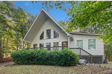 Nestled atop a gentle hill and surrounded by graceful Hemlocks on White Path Golf Club in Georgia - for sale on GolfHomes.com, golf home, golf lot