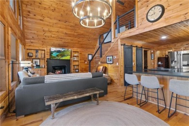 Nestled atop a gentle hill and surrounded by graceful Hemlocks on White Path Golf Club in Georgia - for sale on GolfHomes.com, golf home, golf lot