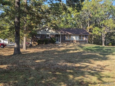 Take a look at this charming 3 bedroom 2 bath home in Terre Du on Terre Du Lac Golf and Country Club in Missouri - for sale on GolfHomes.com, golf home, golf lot
