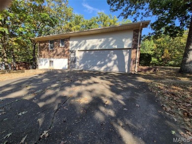 Take a look at this charming 3 bedroom 2 bath home in Terre Du on Terre Du Lac Golf and Country Club in Missouri - for sale on GolfHomes.com, golf home, golf lot