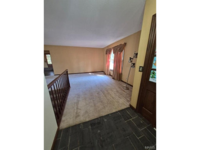 Take a look at this charming 3 bedroom 2 bath home in Terre Du on Terre Du Lac Golf and Country Club in Missouri - for sale on GolfHomes.com, golf home, golf lot