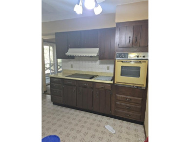 Take a look at this charming 3 bedroom 2 bath home in Terre Du on Terre Du Lac Golf and Country Club in Missouri - for sale on GolfHomes.com, golf home, golf lot