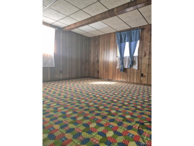 Take a look at this charming 3 bedroom 2 bath home in Terre Du on Terre Du Lac Golf and Country Club in Missouri - for sale on GolfHomes.com, golf home, golf lot