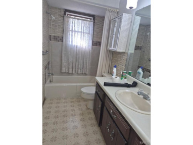 Take a look at this charming 3 bedroom 2 bath home in Terre Du on Terre Du Lac Golf and Country Club in Missouri - for sale on GolfHomes.com, golf home, golf lot