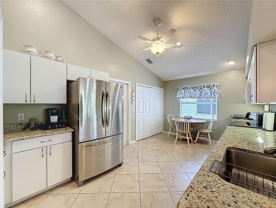 Very popular Canterbury model located on the 15th hole of the on Kings Ridge Golf Club in Florida - for sale on GolfHomes.com, golf home, golf lot