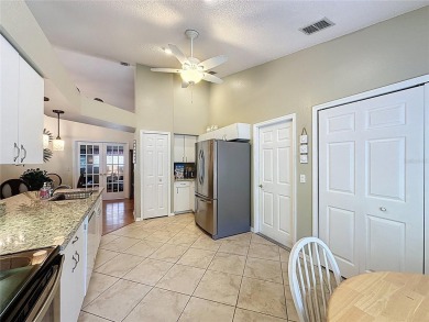 Very popular Canterbury model located on the 15th hole of the on Kings Ridge Golf Club in Florida - for sale on GolfHomes.com, golf home, golf lot