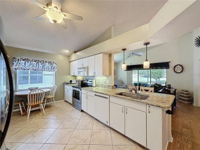 Very popular Canterbury model located on the 15th hole of the on Kings Ridge Golf Club in Florida - for sale on GolfHomes.com, golf home, golf lot