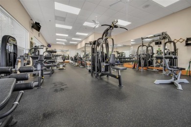 Very popular Canterbury model located on the 15th hole of the on Kings Ridge Golf Club in Florida - for sale on GolfHomes.com, golf home, golf lot